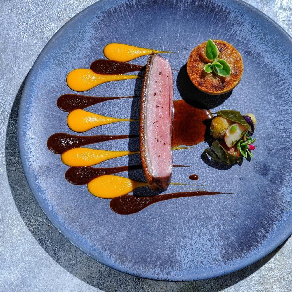 Gabriel Kreuther signature dishes Foie Gras Terrine
Duck Breast
Chive Fromage Blanc